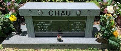 Gray and Black Granite Cremation Memorial Bench with Black Granite Turned Flower Vases and Portraits